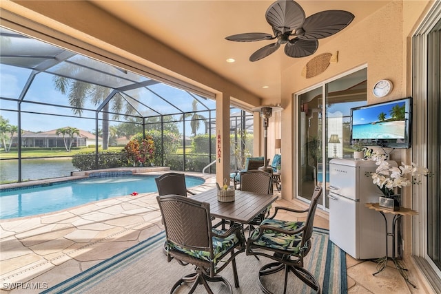 6806 Bent Grass Dr, Naples, FL 34113 - exterior space with a water view, glass enclosure, ceiling fan, and a patio area