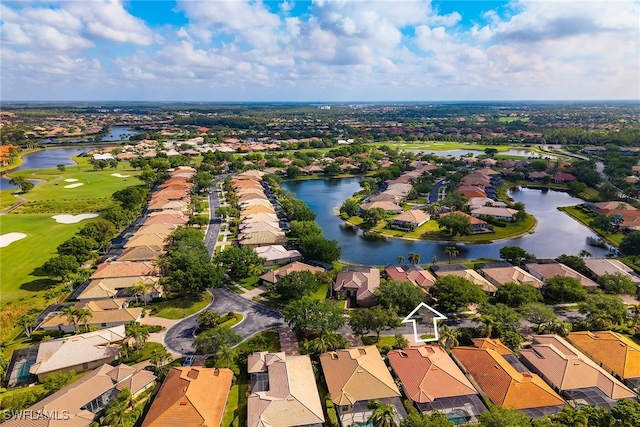 6806 Bent Grass Dr, Naples, FL 34113 - drone / aerial view featuring a water view, view of golf course, and a residential view