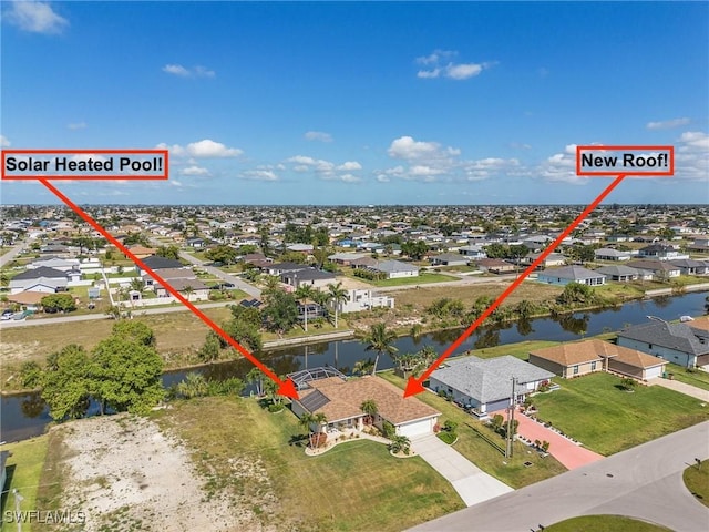 924 NE 11th Ave, Cape Coral, FL 33909 - birds eye view of property with a residential view and a water view