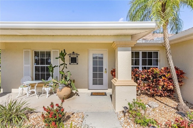 924 NE 11th Ave, Cape Coral, FL 33909 - entrance to property featuring stucco siding and a porch