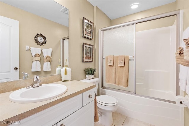 924 NE 11th Ave, Cape Coral, FL 33909 - full bathroom with toilet, shower / bath combination with glass door, tile patterned flooring, and vanity