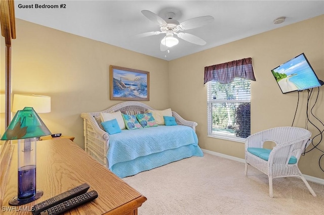 924 NE 11th Ave, Cape Coral, FL 33909 - carpeted bedroom with baseboards and a ceiling fan