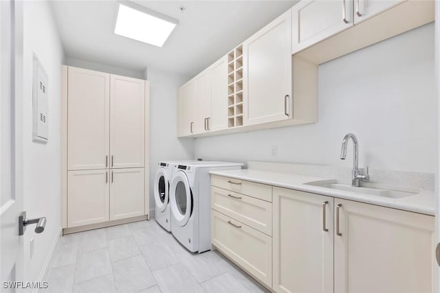 1111 Central Ave Unit 507, Naples, FL 34102 - washroom with separate washer and dryer, cabinet space, and baseboards