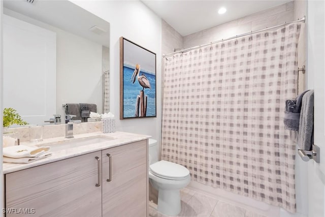1111 Central Ave Unit 507, Naples, FL 34102 - full bathroom with toilet, curtained shower, and vanity