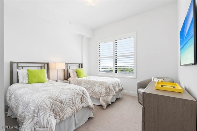 1111 Central Ave Unit 507, Naples, FL 34102 - bedroom with light colored carpet and baseboards