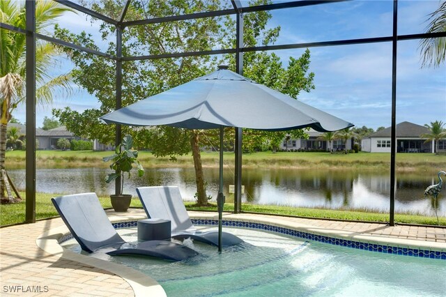 pool featuring a water view and glass enclosure