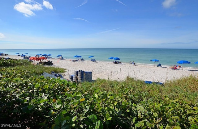 6361 Pelican Bay Blvd Unit 605, Naples, FL 34108 - view of water feature featuring a view of the beach