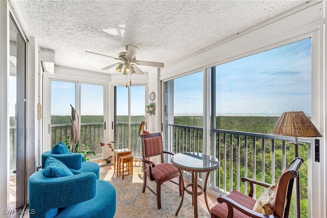 6361 Pelican Bay Blvd Unit 605, Naples, FL 34108 - sunroom / solarium featuring a textured ceiling and a wealth of natural light