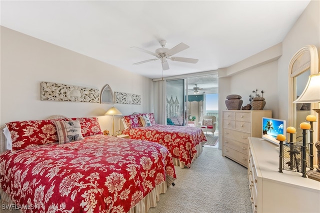 6361 Pelican Bay Blvd Unit 605, Naples, FL 34108 - bedroom featuring access to exterior, a ceiling fan, light colored carpet, and floor to ceiling windows