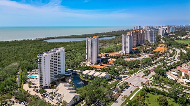 6361 Pelican Bay Blvd Unit 605, Naples, FL 34108 - drone / aerial view featuring a water view and a city view