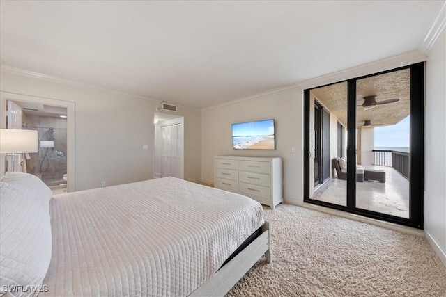174 S Collier Blvd Unit 504, Marco Island, FL 34145 - carpeted bedroom with access to exterior, ornamental molding, connected bathroom, and baseboards