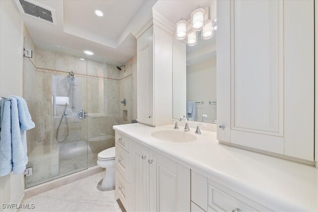 174 S Collier Blvd Unit 504, Marco Island, FL 34145 - bathroom featuring toilet, a shower stall, vanity, recessed lighting, and tile patterned floors