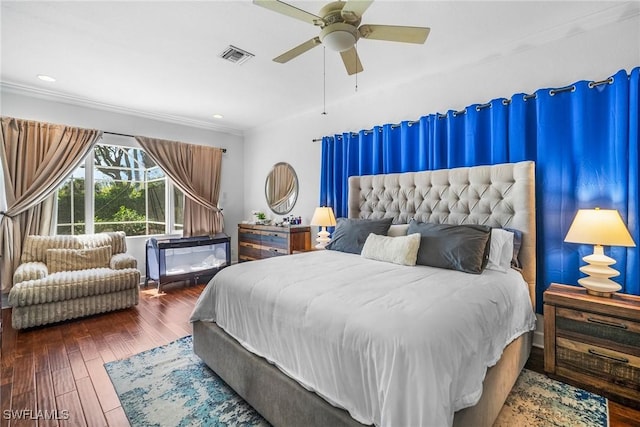 bedroom with crown molding, ceiling fan, visible vents, recessed lighting, and hardwood / wood-style floors