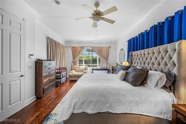 bedroom with dark wood finished floors, ceiling fan, baseboards, and ornamental molding