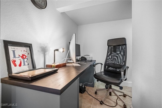 tiled office space with baseboards
