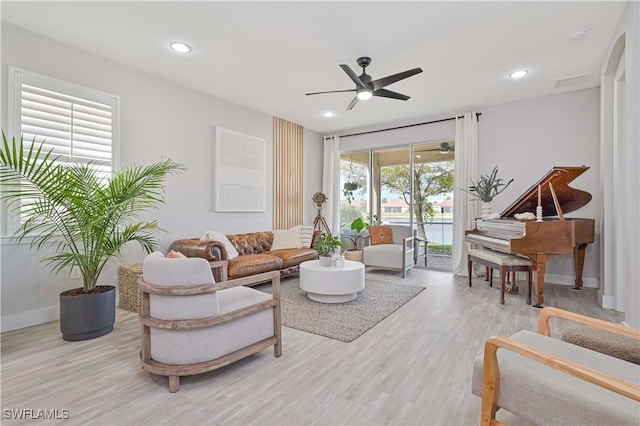 3544 Brittons Ct, Fort Myers, FL 33916 - living room featuring recessed lighting, light wood-style flooring, baseboards, and a ceiling fan