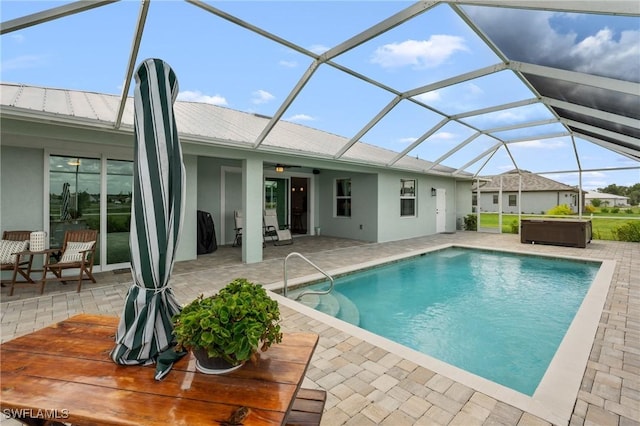 14190 Binghampton Dr, Fort Myers, FL 33905 - outdoor pool featuring a patio area, a hot tub, ceiling fan, and a lanai