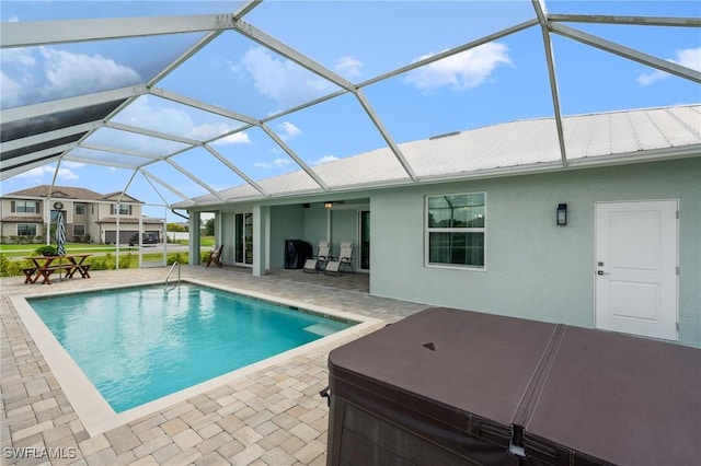 14190 Binghampton Dr, Fort Myers, FL 33905 - outdoor pool with a hot tub, a patio, and a lanai