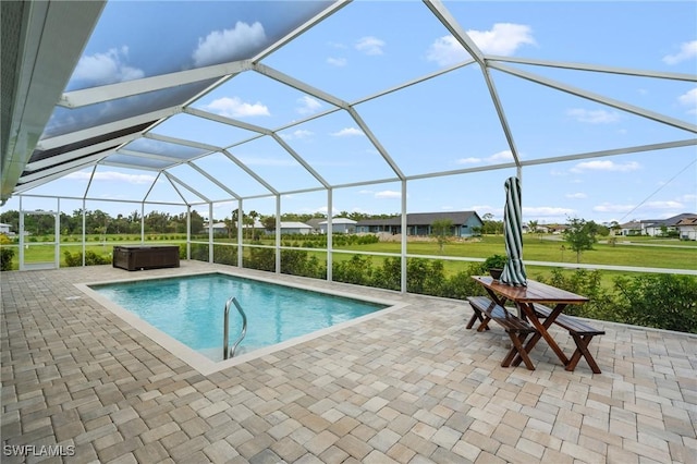14190 Binghampton Dr, Fort Myers, FL 33905 - swimming pool featuring a hot tub, a patio area, and glass enclosure
