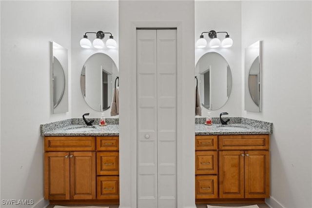 14190 Binghampton Dr, Fort Myers, FL 33905 - full bathroom with a closet and two vanities