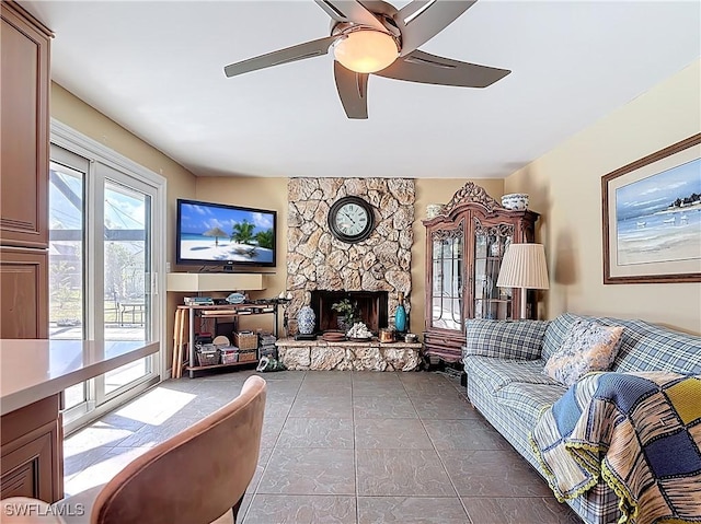 432 SW 38th St, Cape Coral, FL 33914 - living area featuring a fireplace and a ceiling fan