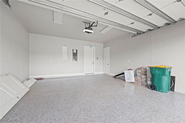 1136 Trail Terrace Dr, Naples, FL 34103 - garage featuring electric panel and a garage door opener