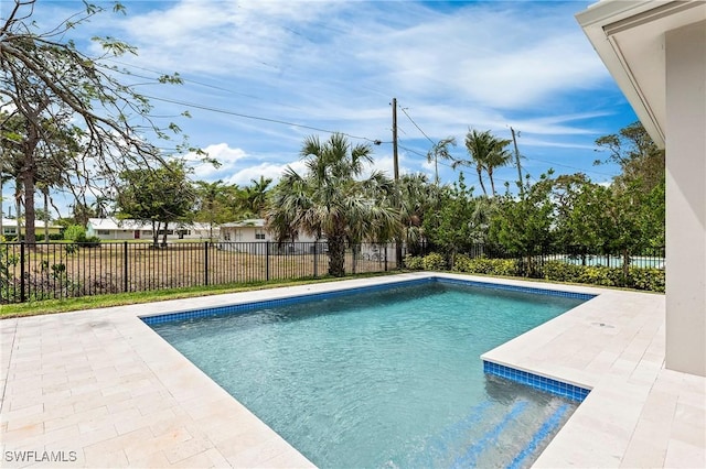 1136 Trail Terrace Dr, Naples, FL 34103 - view of swimming pool featuring a fenced backyard, a fenced in pool, and a patio