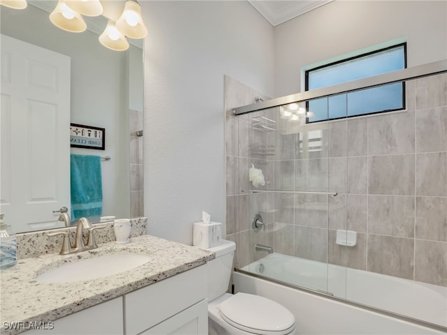 19469 The Place Blvd, Estero, FL 33928 - bathroom featuring toilet, an inviting chandelier, vanity, enclosed tub / shower combo, and ornamental molding