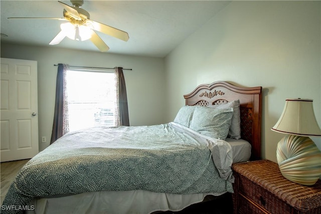 77 Cardinal Dr, North Fort Myers, FL 33917 - bedroom with a ceiling fan and wood finished floors