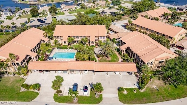 bird's eye view with a water view