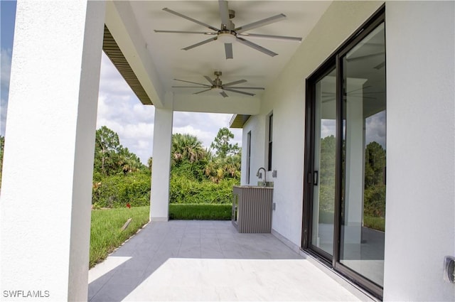 3202 72nd St W, Lehigh Acres, FL 33971 - view of patio with ceiling fan and a sink