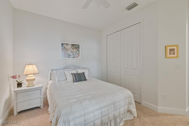 7024 Mistral Way, Fort Myers, FL 33966 - bedroom with light colored carpet, a closet, and a ceiling fan