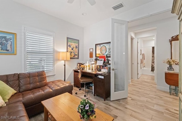 7024 Mistral Way, Fort Myers, FL 33966 - home office featuring light wood-type flooring and ceiling fan