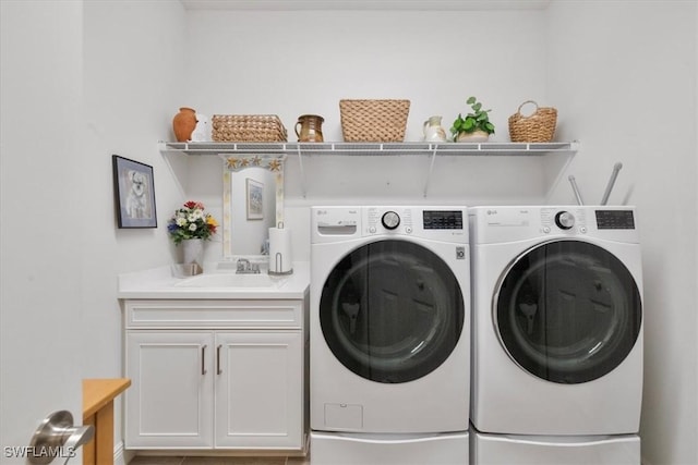 7024 Mistral Way, Fort Myers, FL 33966 - laundry room with washing machine and clothes dryer and cabinet space