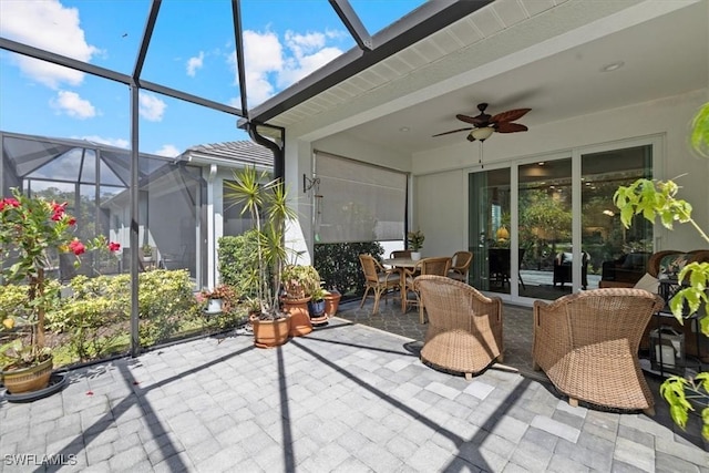 7024 Mistral Way, Fort Myers, FL 33966 - sunroom with a ceiling fan, outdoor dining area, and plenty of natural light