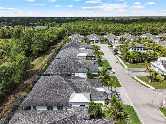 7024 Mistral Way, Fort Myers, FL 33966 - aerial perspective of suburban area with a forest