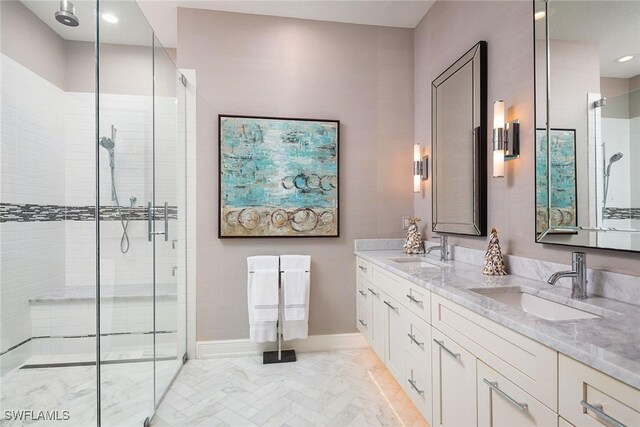 1002 Fountain Run, Naples, FL 34119 - full bath featuring a stall shower, double vanity, and baseboards
