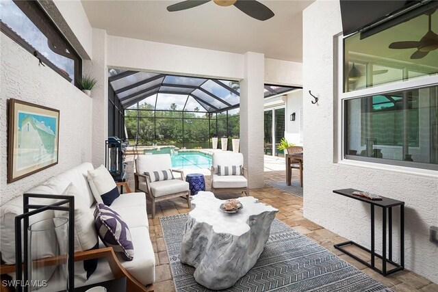 1002 Fountain Run, Naples, FL 34119 - view of patio with a ceiling fan, an outdoor living space, an outdoor pool, and a lanai