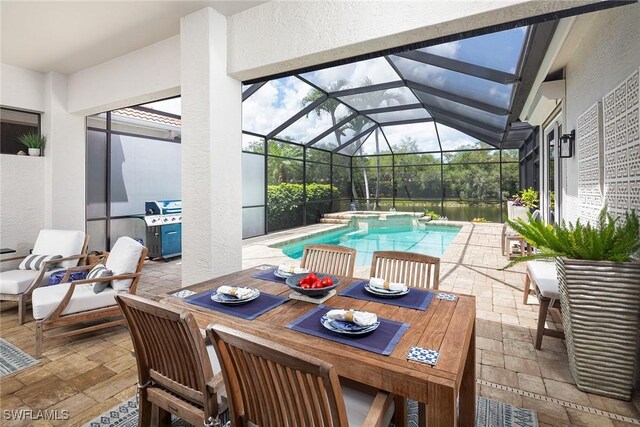 1002 Fountain Run, Naples, FL 34119 - view of pool with a patio, a pool with connected hot tub, a lanai, and outdoor dining space