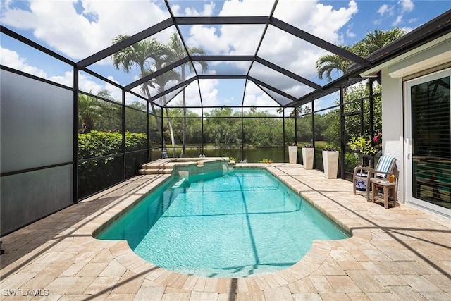 1002 Fountain Run, Naples, FL 34119 - view of swimming pool with a patio, a pool with connected hot tub, a water view, and glass enclosure
