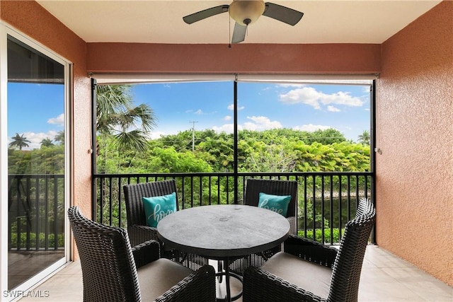 10021 Heather Ln Unit 803, Naples, FL 34119 - sunroom featuring ceiling fan and outdoor dining space