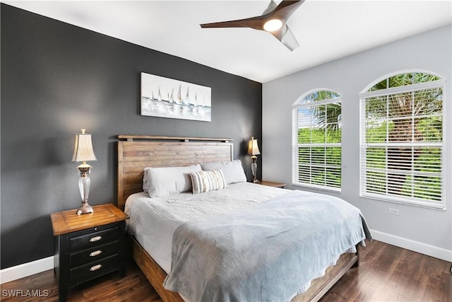 10021 Heather Ln Unit 803, Naples, FL 34119 - bedroom with wood finished floors, baseboards, and a ceiling fan