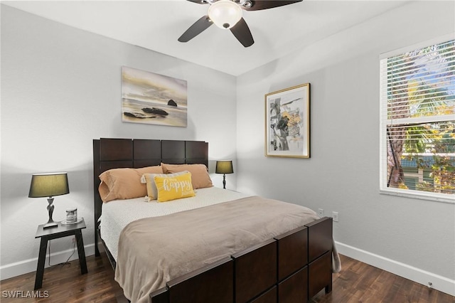 10021 Heather Ln Unit 803, Naples, FL 34119 - bedroom with dark wood finished floors, baseboards, a ceiling fan, and multiple windows