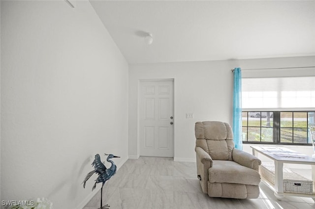4116 SW 15th Ave, Cape Coral, FL 33914 - sitting room with baseboards and lofted ceiling