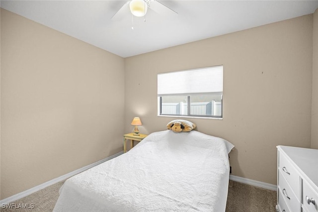 4116 SW 15th Ave, Cape Coral, FL 33914 - bedroom featuring a ceiling fan, baseboards, and carpet