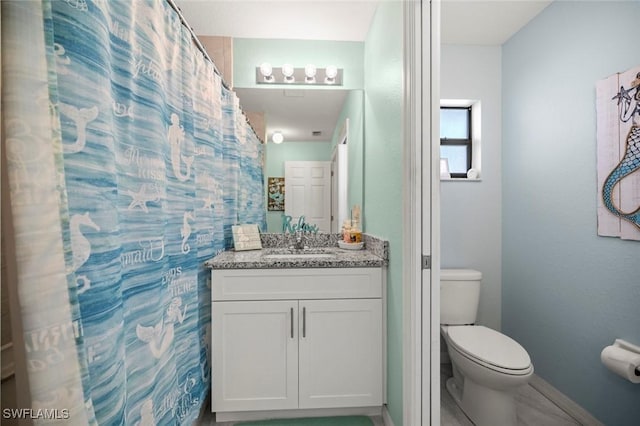 4116 SW 15th Ave, Cape Coral, FL 33914 - full bath with vanity, toilet, and baseboards