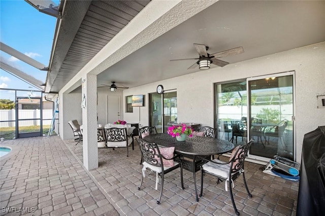 4116 SW 15th Ave, Cape Coral, FL 33914 - view of patio with outdoor lounge area, a ceiling fan, a lanai, and outdoor dining space