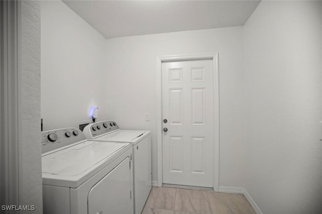 4116 SW 15th Ave, Cape Coral, FL 33914 - clothes washing area featuring baseboards, laundry area, and washer and clothes dryer
