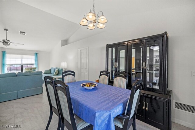 4116 SW 15th Ave, Cape Coral, FL 33914 - dining area featuring lofted ceiling, visible vents, and ceiling fan with notable chandelier