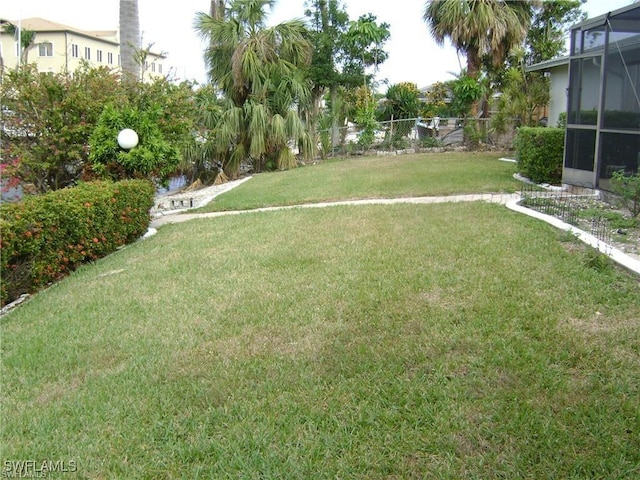3708 SE 16th Pl, Cape Coral, FL 33904 - view of yard featuring fence